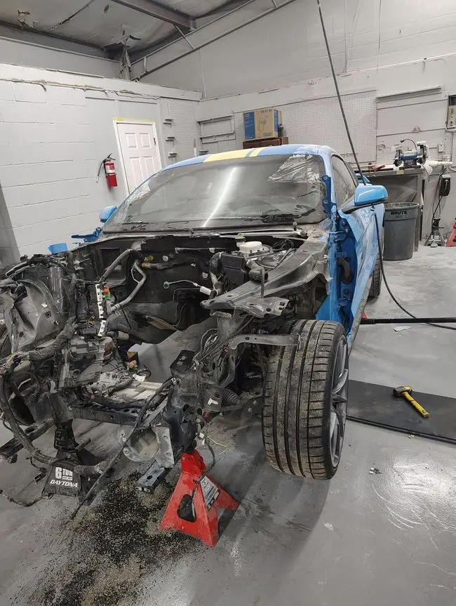 Vehicle undergoing repair at Easy Out Collision Center.